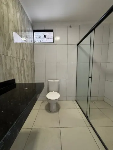 Casa Comercial Atrás da Banca, Perto da Orla.