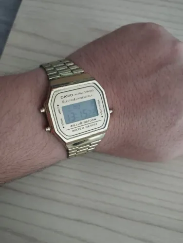 Relógio Casio R$:100 Reais Original Dourado