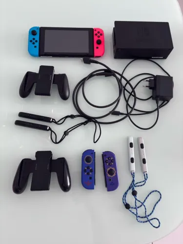 Nintendo Switch 1 V2 + Controles Extras Zelda + MicroSD 128 GB