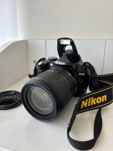 Nikon D5000 + 18-105mm VR + Acessórios