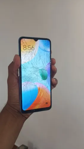CELULAR REDMI com marcas de uso
