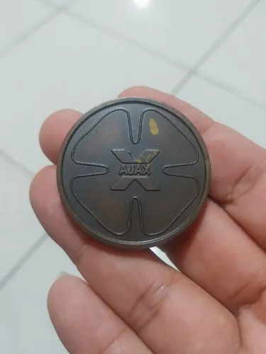 medalha promocional da extinta Ajax Cia. de Seguros