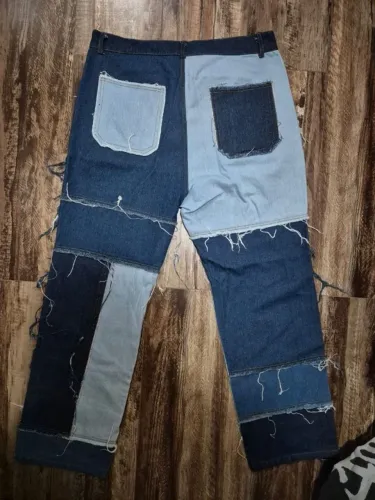calça jeans retalhada 38/40 unissex