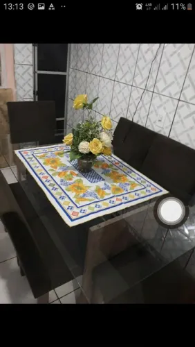 Mesa tampo de vidro com 6 cadeiras