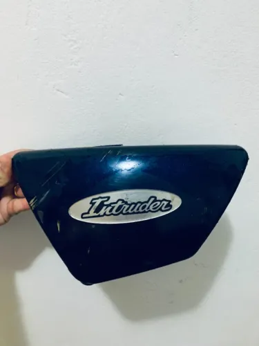 Tampa lateral  esquerda moto intruder 125 lado da marcha; usada