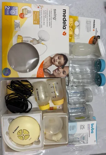 Bomba elétrica medela Swing com 25 sacos para armazenar leite novos e vidros