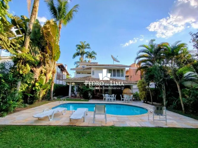 Casa com 5 dormitórios para alugar por R$ 3.000,00/dia - Riviera Módulo 4 - Bertioga/SP