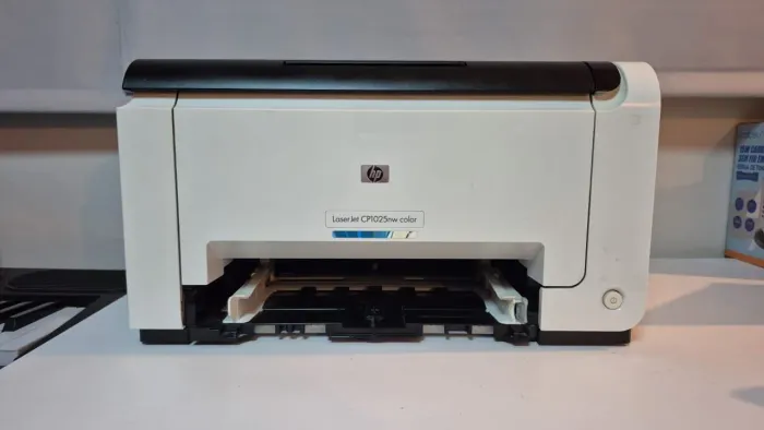? Impressora HP LaserJet CP1025nw Color