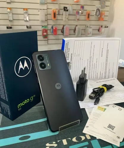 Celular 128gb com caixa é tudo  todo completo pegando 5 g internet carregador original 