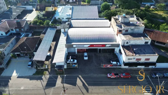 Prédio comercial em amplo terreno e na Avenida - Novo Hamburgo