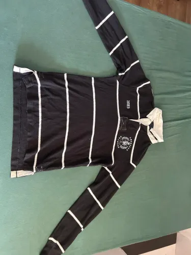 Polo tommy manga longa