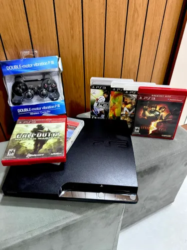 PlayStation 3 com 6 jogos originais 1 controle novo