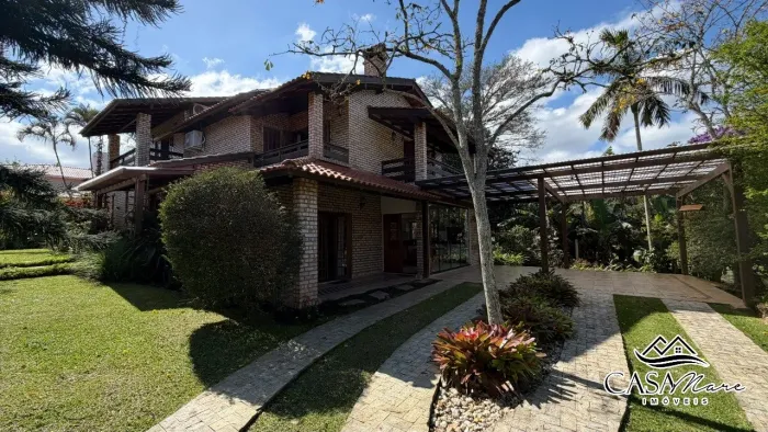 Casa à venda em condomínio fechado em Cacupé, Florianópolis/SC - Vista para o lago