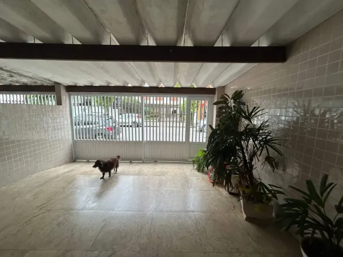 Casa 03 quartos sobreposta baixa com edicula Boqueirão Santos