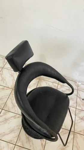 Cadeira de barbeiro e caneleiro