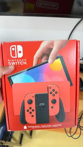 Nintendo switch - oled 64GB + 3 jogos físicos