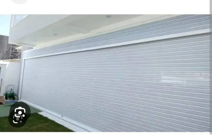 Portão garagem de enrolar usado 7 metros e meio de largura com motor 2 controle 