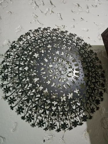Divina Mandala em aço corten 1m de diâmetro 