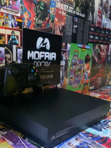 Xbox one x 1tb4k seminovo com garantia cinco meses dois jogos de brinde