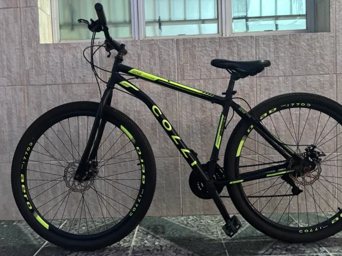 VENDO UMA BICICLETA DA MARCA (COLLI )POUCAS VEZES USADA MUITO BEM CONSERVADA.
