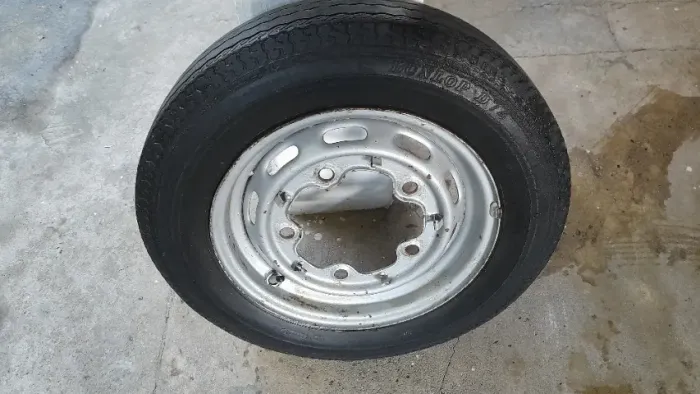Roda Fusca 5 Furos Aro 15 Original com Pneu Dunlop - D74 Reformado