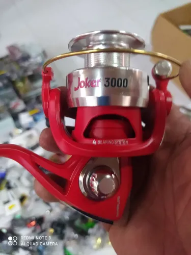 Vendo um lote de material de pesca molinete varas isca artificial