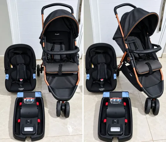 Carrinho de bebê com bebê conforto 
