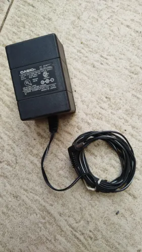 Adaptador AC DC 800mA modelo vintage CASIO AD-K64