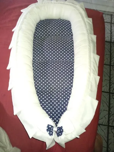 Vendo ninho redutor com roupas para recém nascido