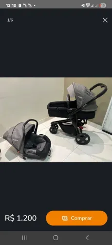 Carrinho com bebê conforto com base 