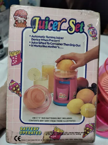 Antigo brinquedo máquina de fazer suco