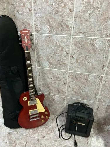 Guitarra Strinberg Modelo Les Paul + Caixa meteoro e cabo