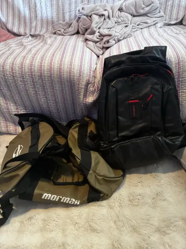Mochila Samsonite e mormaii Ambos usadas