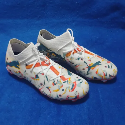 Chuteira Puma Future 7 Match MG - Branco/Laranja/Amarelo