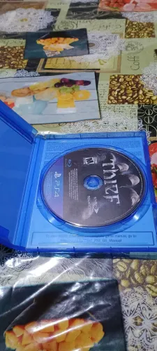 Jogo de PS4 mídia física original thief 