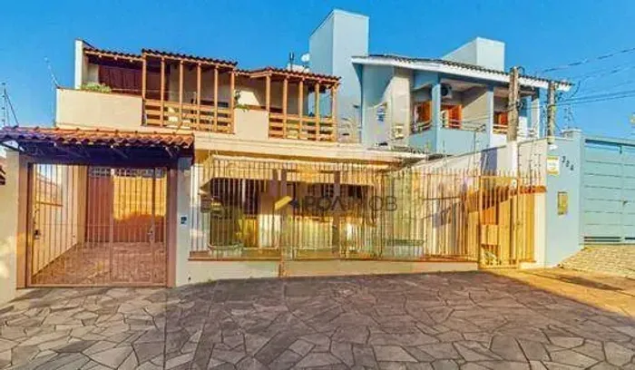 Casa com 4 dormitórios para alugar, 354 m² por R$ 5.306,00/mês - Cristo Rei - São Leopoldo
