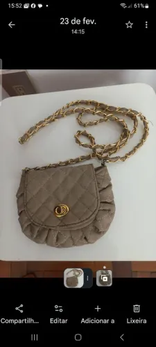 Bolsa com corrente dourada