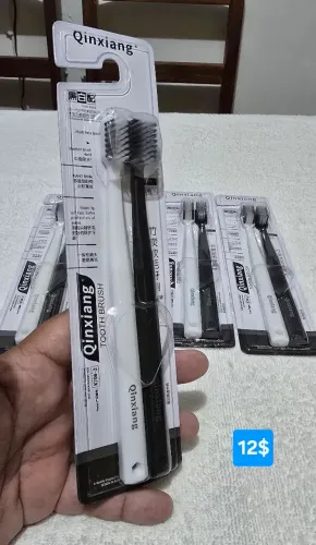 Escova de dentes da Qinxiang o par