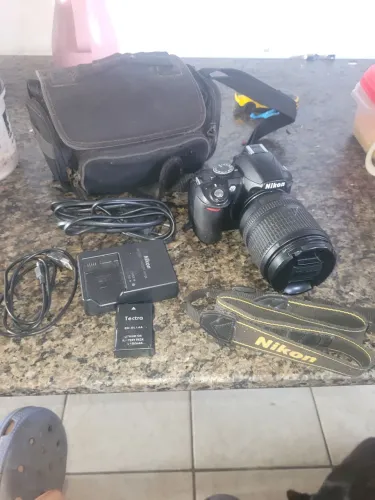 Nikon d3100 leia descrição