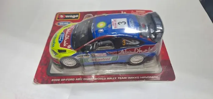 miniatura rally ford abu dhabiworld - burago - escala 1:32