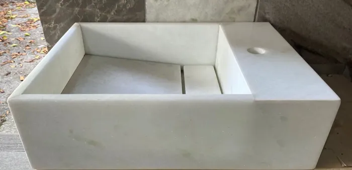 Lavatório mármore branco com cuba esculpida