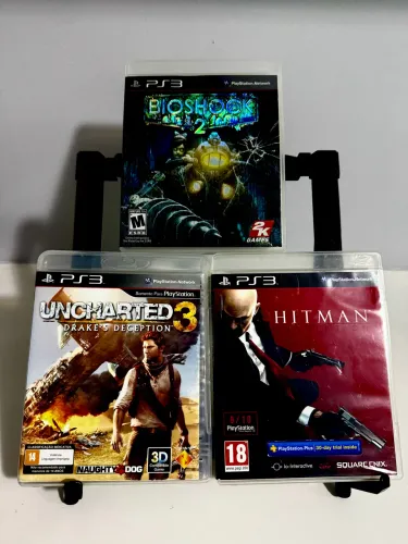 PACK Acao Classica - 3 Jogos PS3 | Uncharted 3 + BioShock 2 + Hitman Absolution