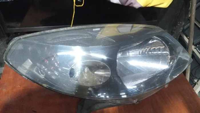 farol Sandero 2008 2011 esquerdo