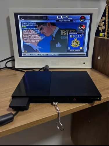 PlayStation 2 + 1 controle + 213 jogos