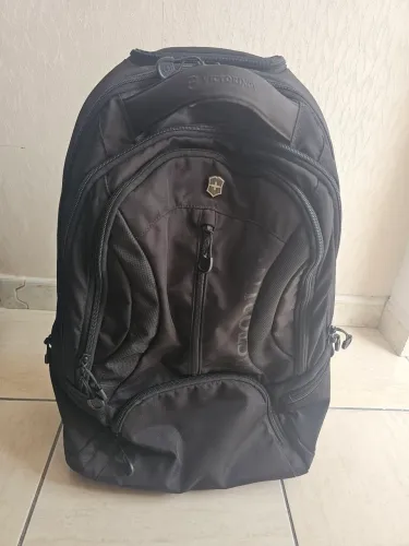 Mochila com carrinho Victorinox Vx Sport Wheeled Scout preta.