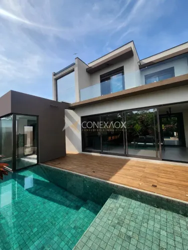 Casa à venda em condomínio com 4 suítes, escritório e home theater, em Campinas