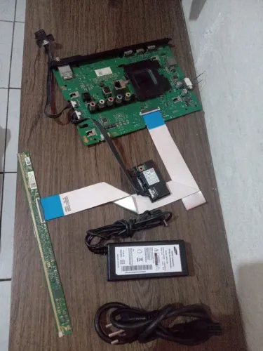 Placa mãe 32 , funcionando perfeitamente com a fonte nova .