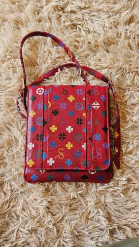 Bolsa em courino vermelho