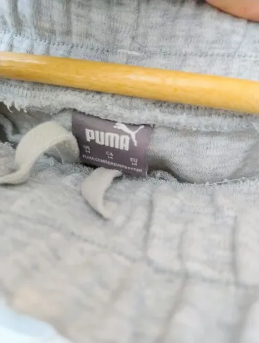 Calça Puma moletom evoestrip m