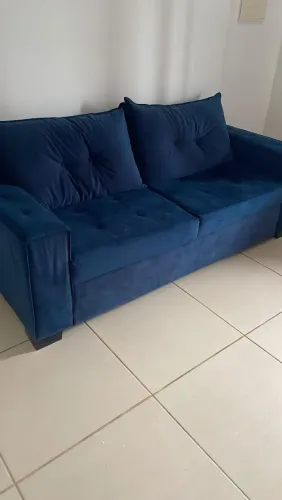 Sofá azul semi novo
